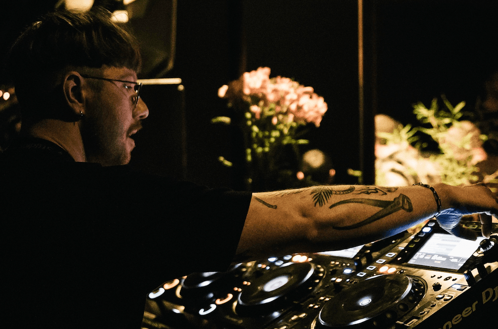 DJ playing in the club on CDJ players